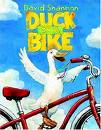 [duck+on+a+bike.jpg]