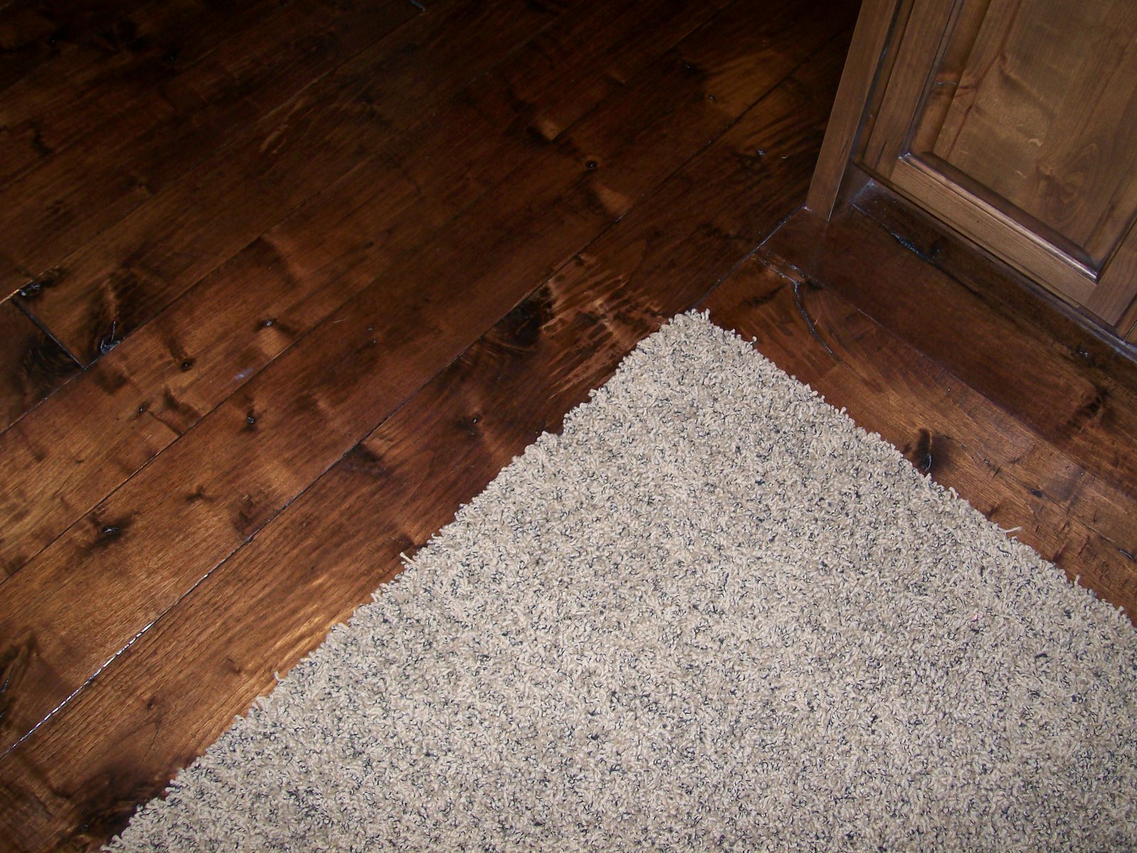 [carpet+and+wood+floors.jpg]