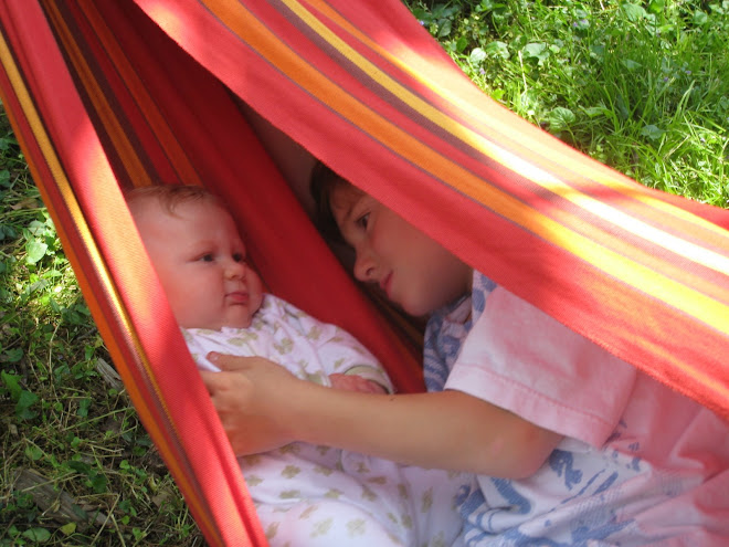 Luke and Asher cuddling in the hammock