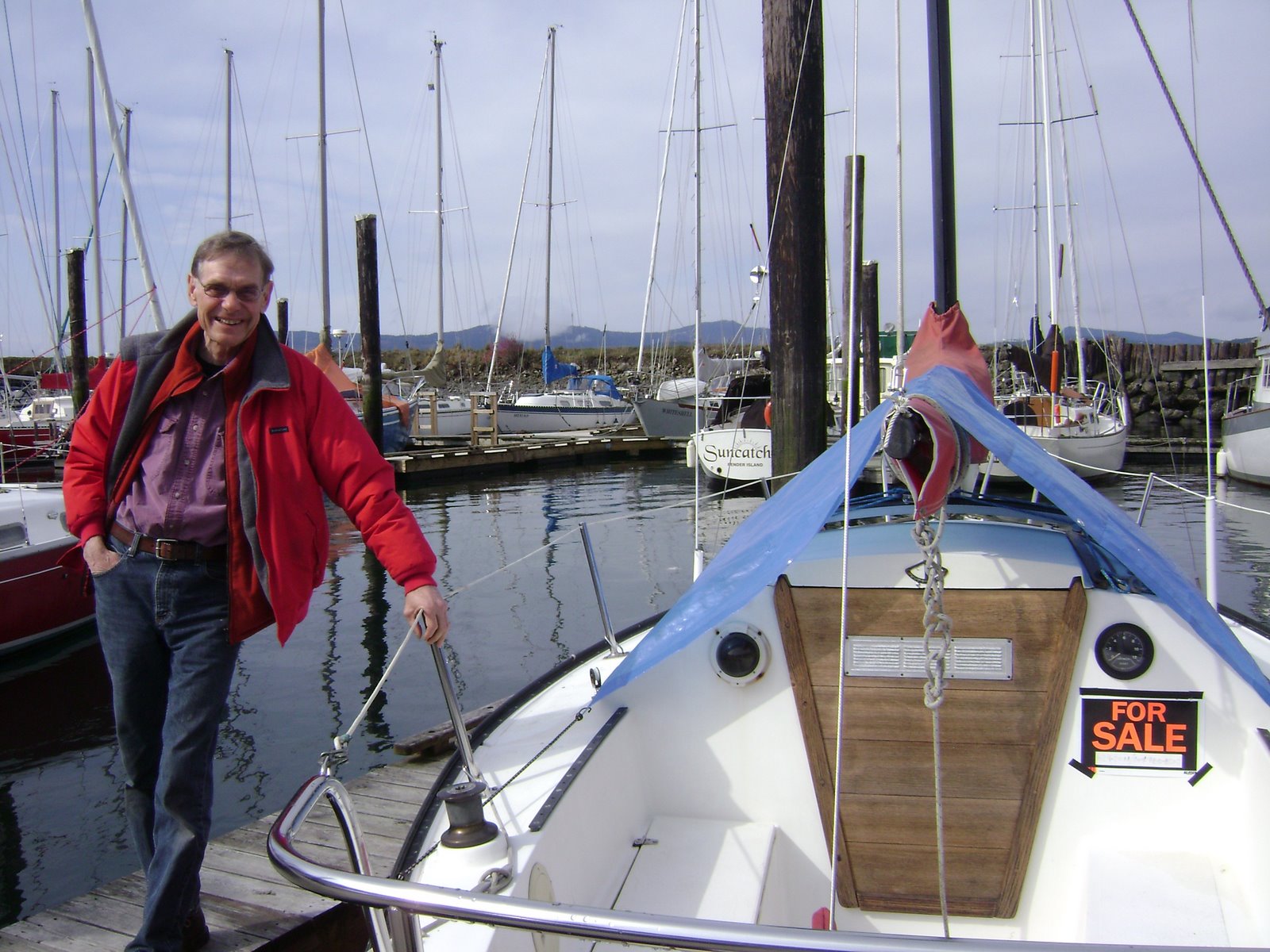 Garney inspects boat for sale at Thieves Marina