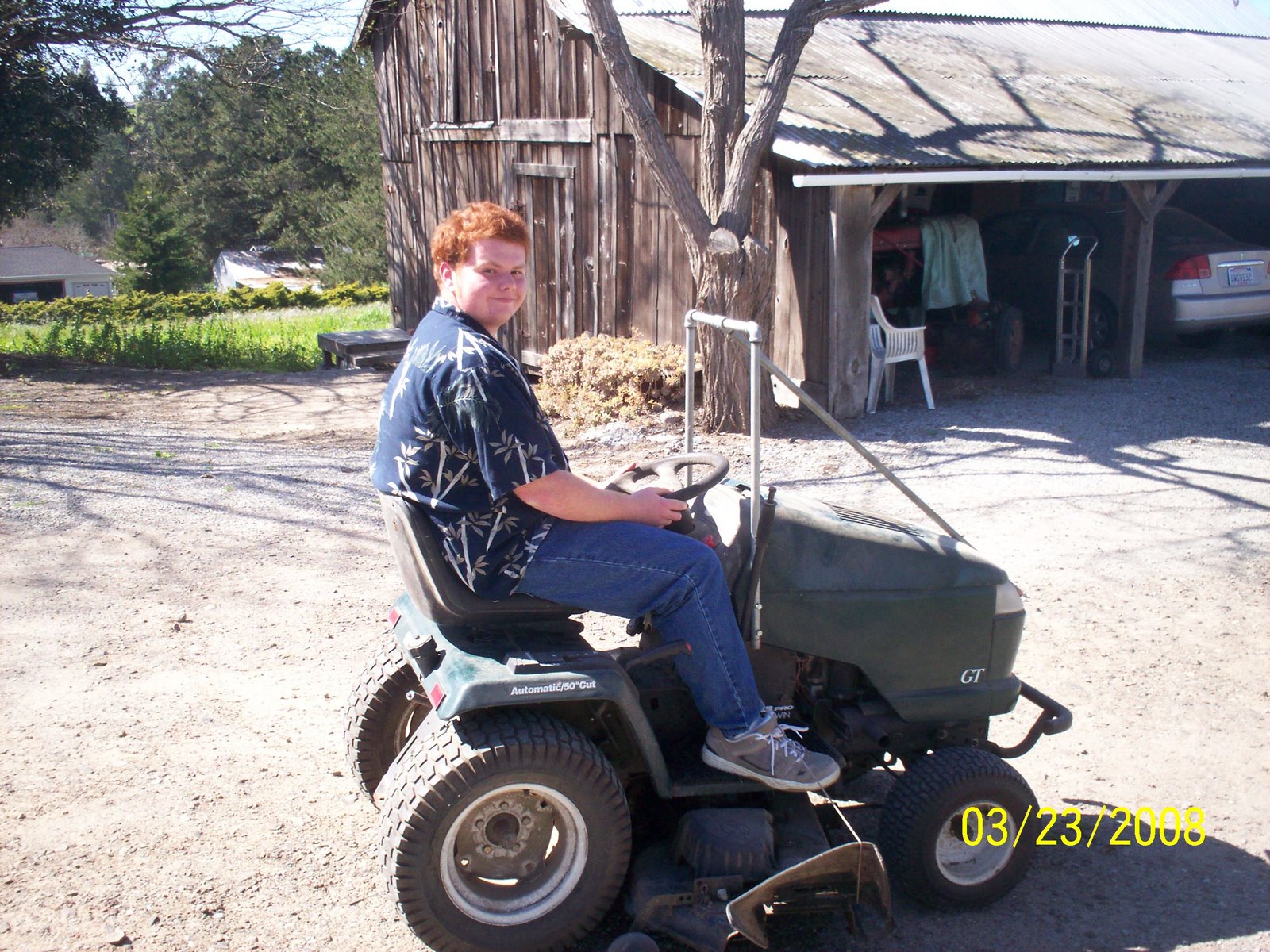 [Bobby+on+tractor.2008.jpg]