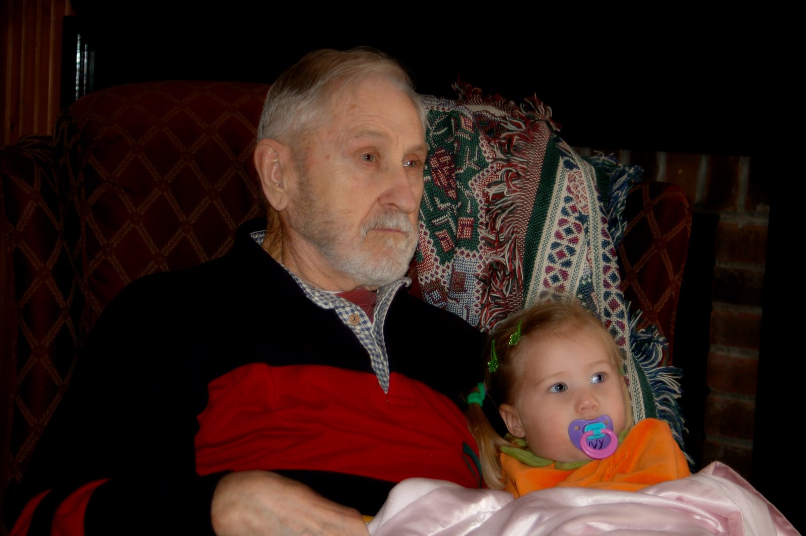 [Ivy+and+Great+Grandpa+Anderson+watching+a+movie+at+Grandpa's+house.jpg]