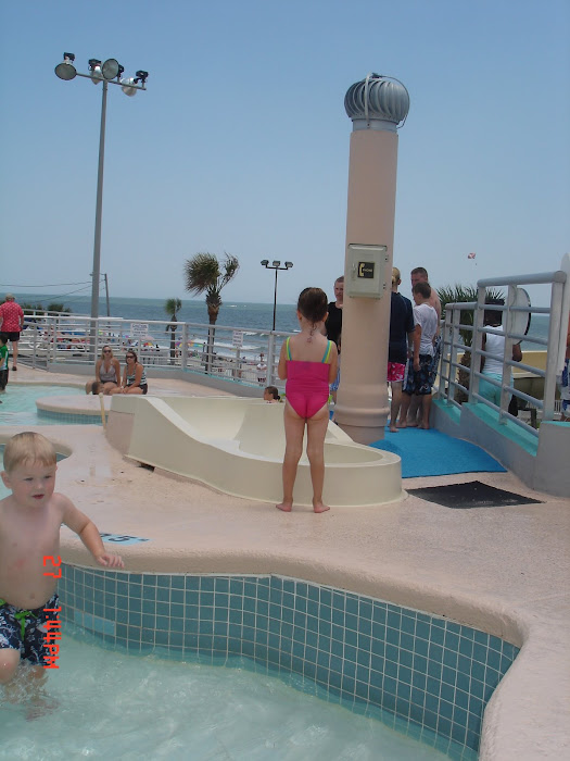 at the waterpark,couldn't you just squeese those cute little cheeks(Jordan in pink suit)