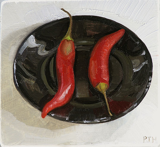 [Two+Red+Chillies+on+Black+Saucer.jpg]