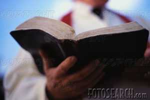 [pastor-holding-bible_~WED0047.jpg]