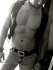 [leather+hunk+barechest+leather+vest+with+tight+jeans.jpg]