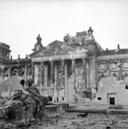 [180px-Reichstag_after_the_allied_bombing_of_Berlin.jpg]