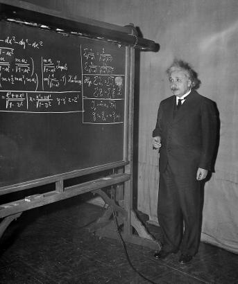 [Einstein-at-blackboard-chalk-in-hand.jpg]