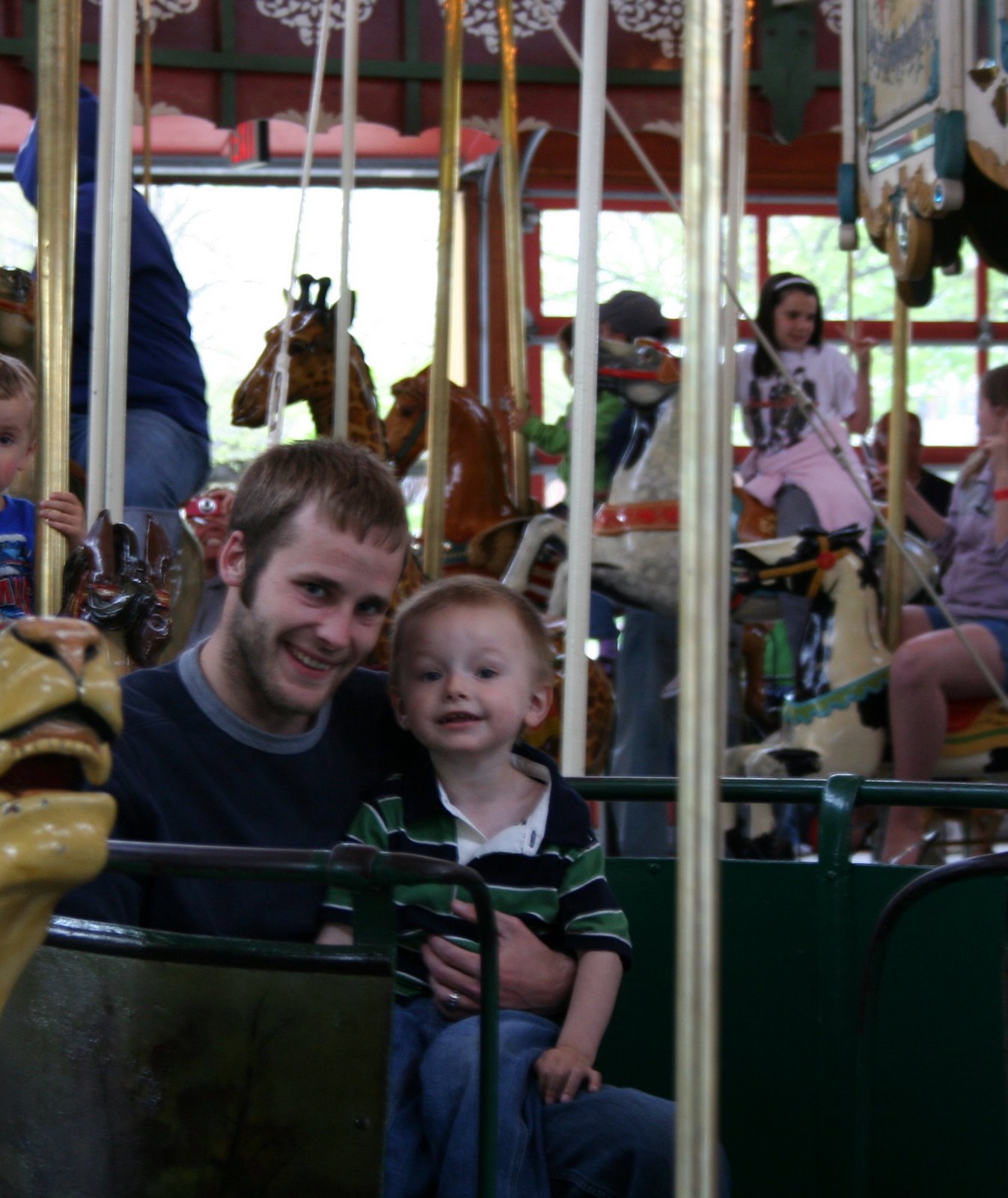 [daddy+and+Will+on+the+carosel.JPG]