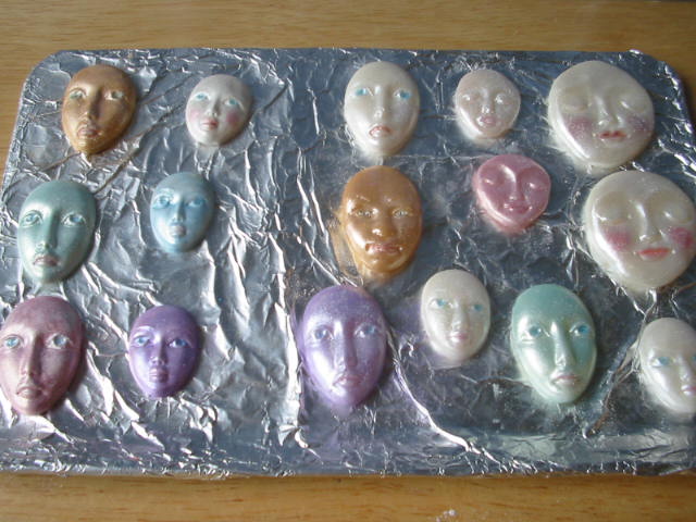 [Faces+painted+just+before+baking.JPG]