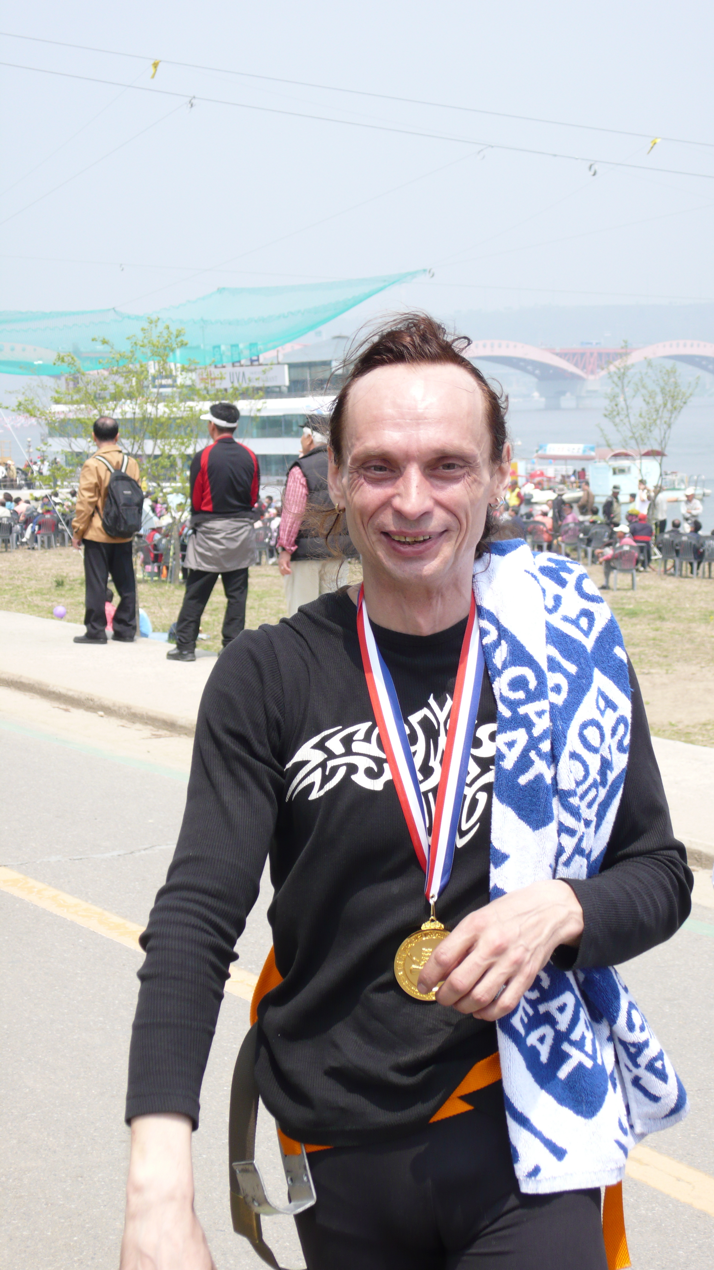 Portrait of Valery Svezhov after completing the 1km high wire walk across the Han river 