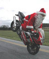[santa+motorcycle+trick.jpg]