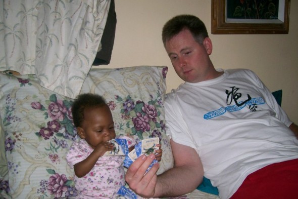 [lilly+&+daddy+playing+cards.jpg]