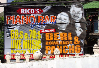 Oh dear. Tacky music in Patong - advertising just outside the temple