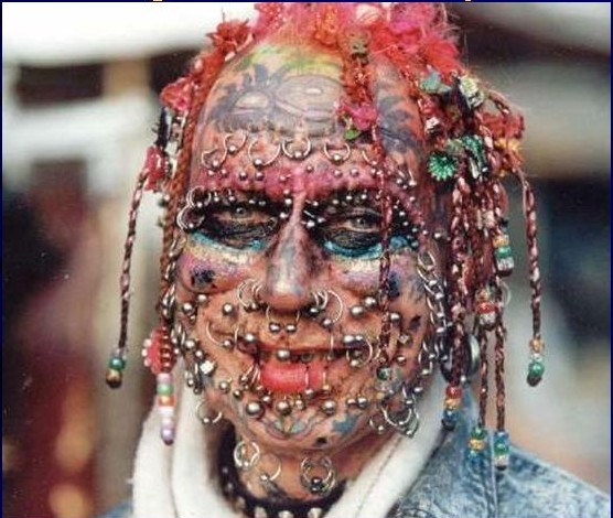 tattoos and piercings as long as they don't disfigure themselves like this: 