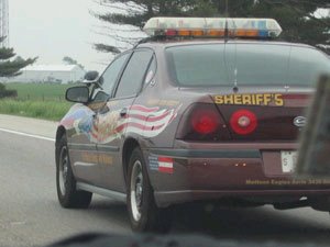 [cop+driving+slow.bmp]