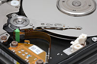 [200px-Hard_disk_platters_and_head.jpg]