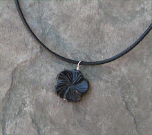 Carved Black Onyx Flower on Leather