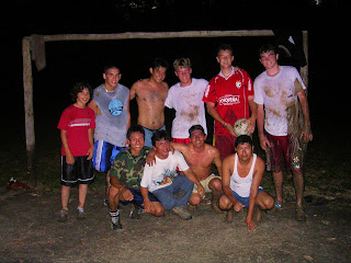 Boys join jungle soccer match.