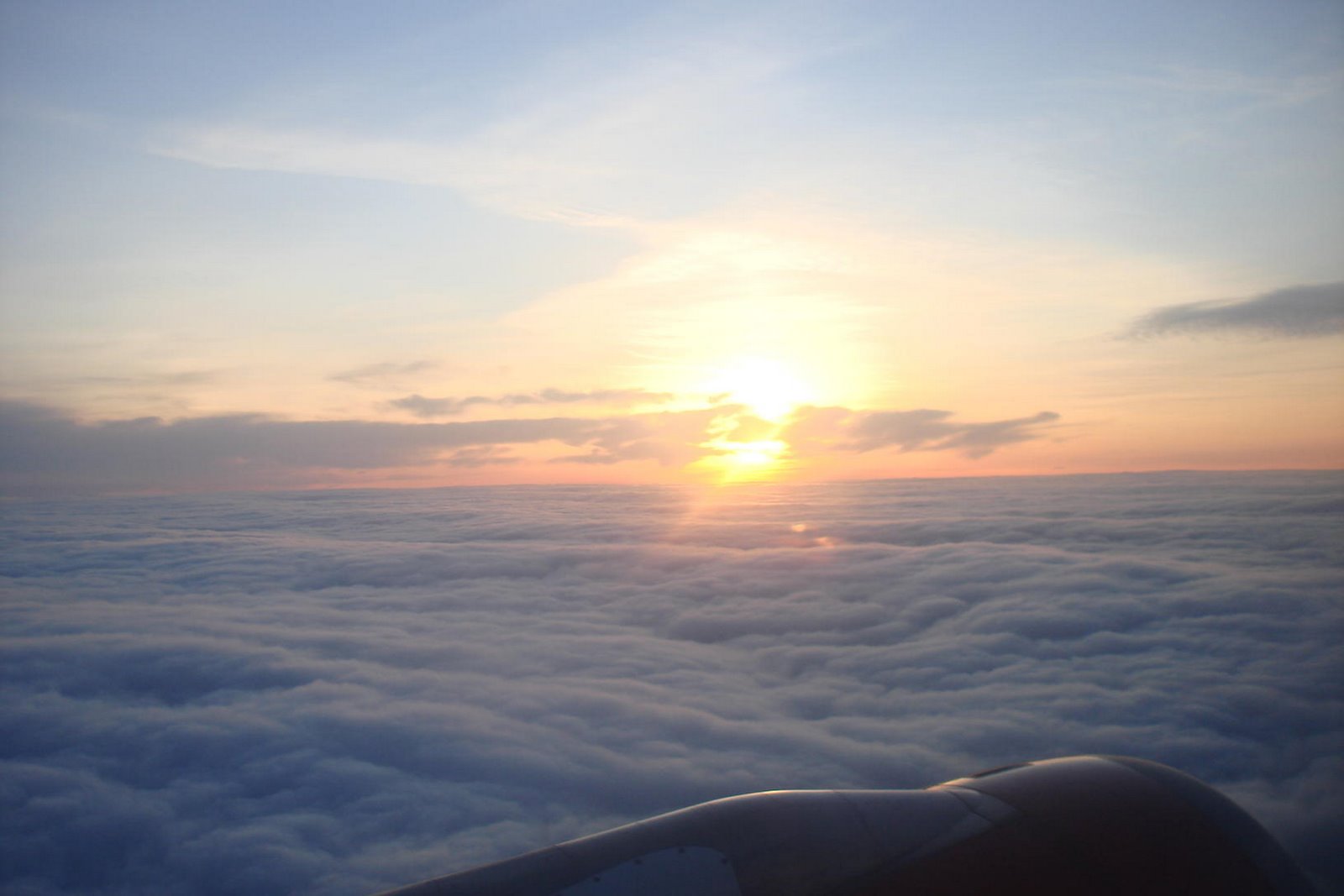 Sunrise - viewed out the window of bmi's BD79 - winging its way from Belfast City Airport to London Heathrow