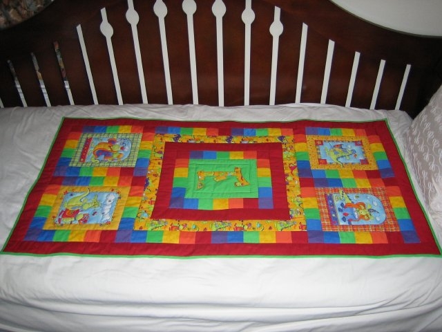 [Baby+Flicks+Quilt+Finished+Bed+Front.JPG]