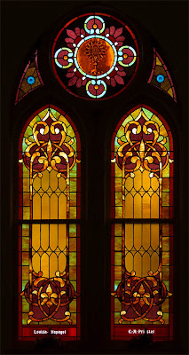 Saint Theodore Roman Catholic Church, in Flint Hill, Missouri, USA - golden stained glass window