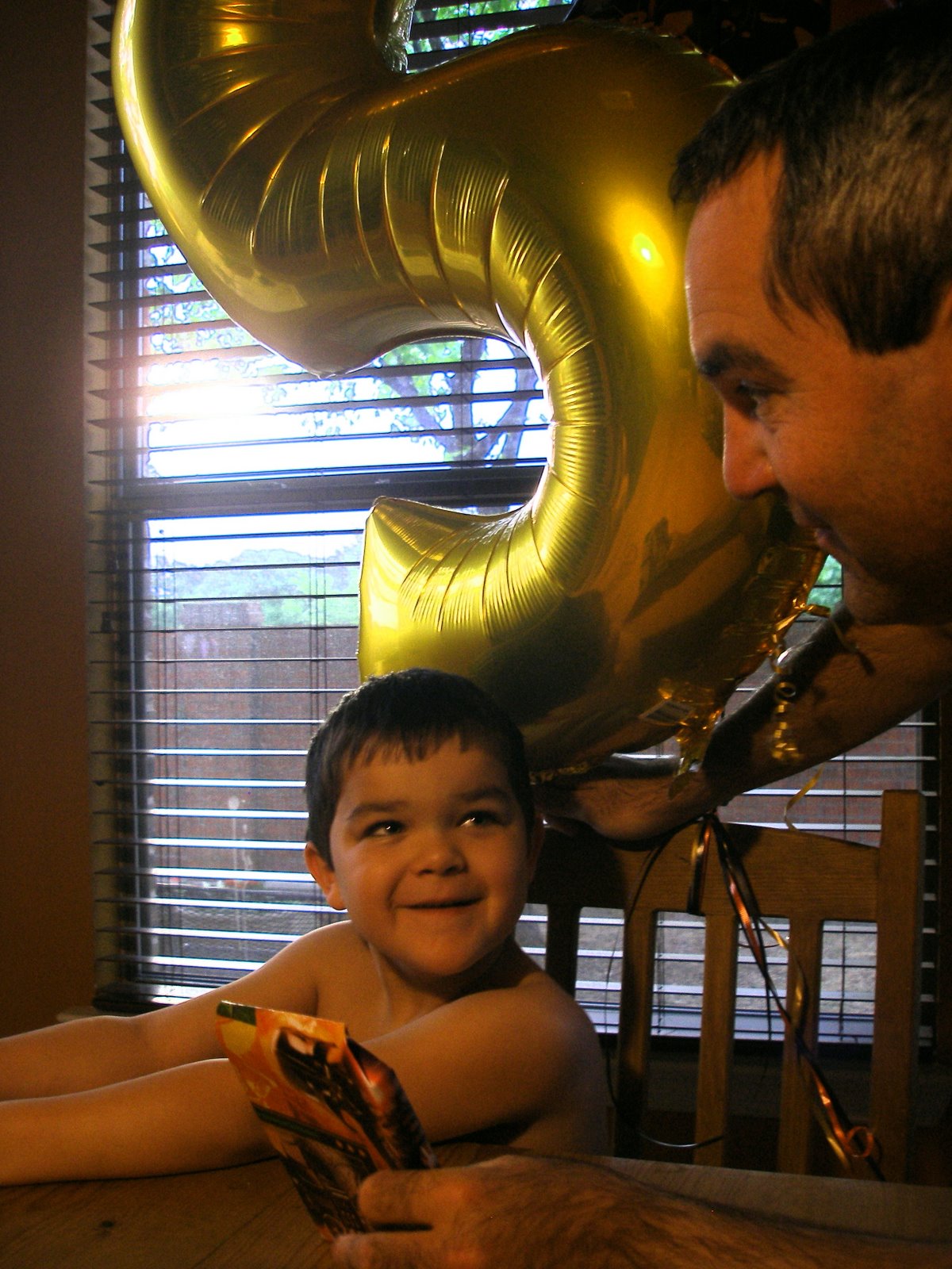 [jake+and+dad+on+birthday.jpg]
