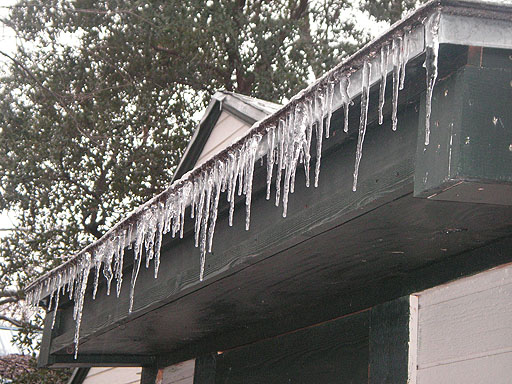 [03+icicles+on+our+house.jpg]