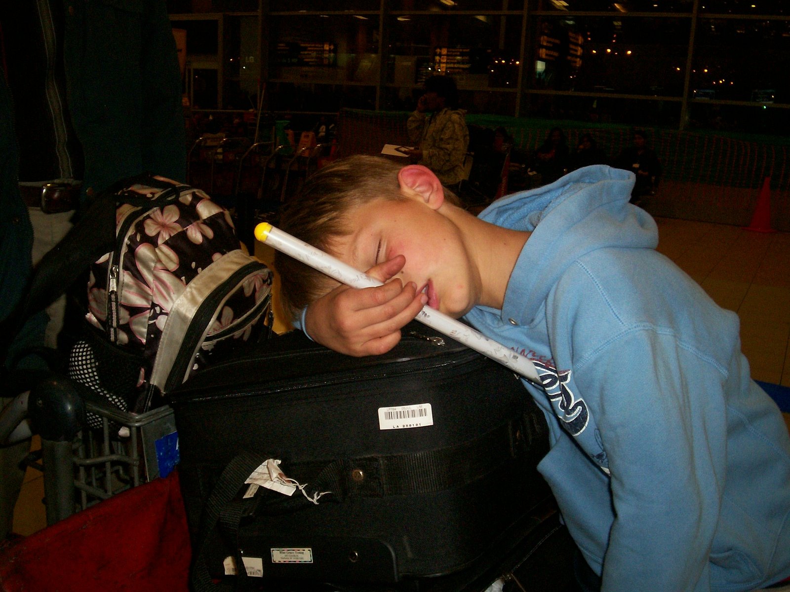 [sleeping+Josh-tired+traveler.jpg]