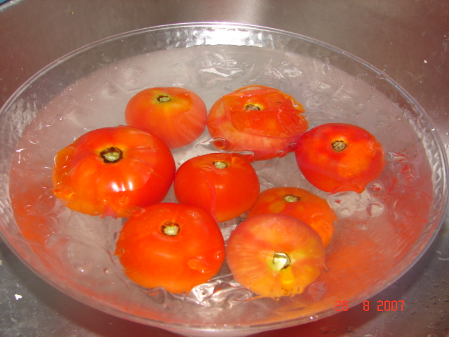 [Peeling+tomatoes.JPG]