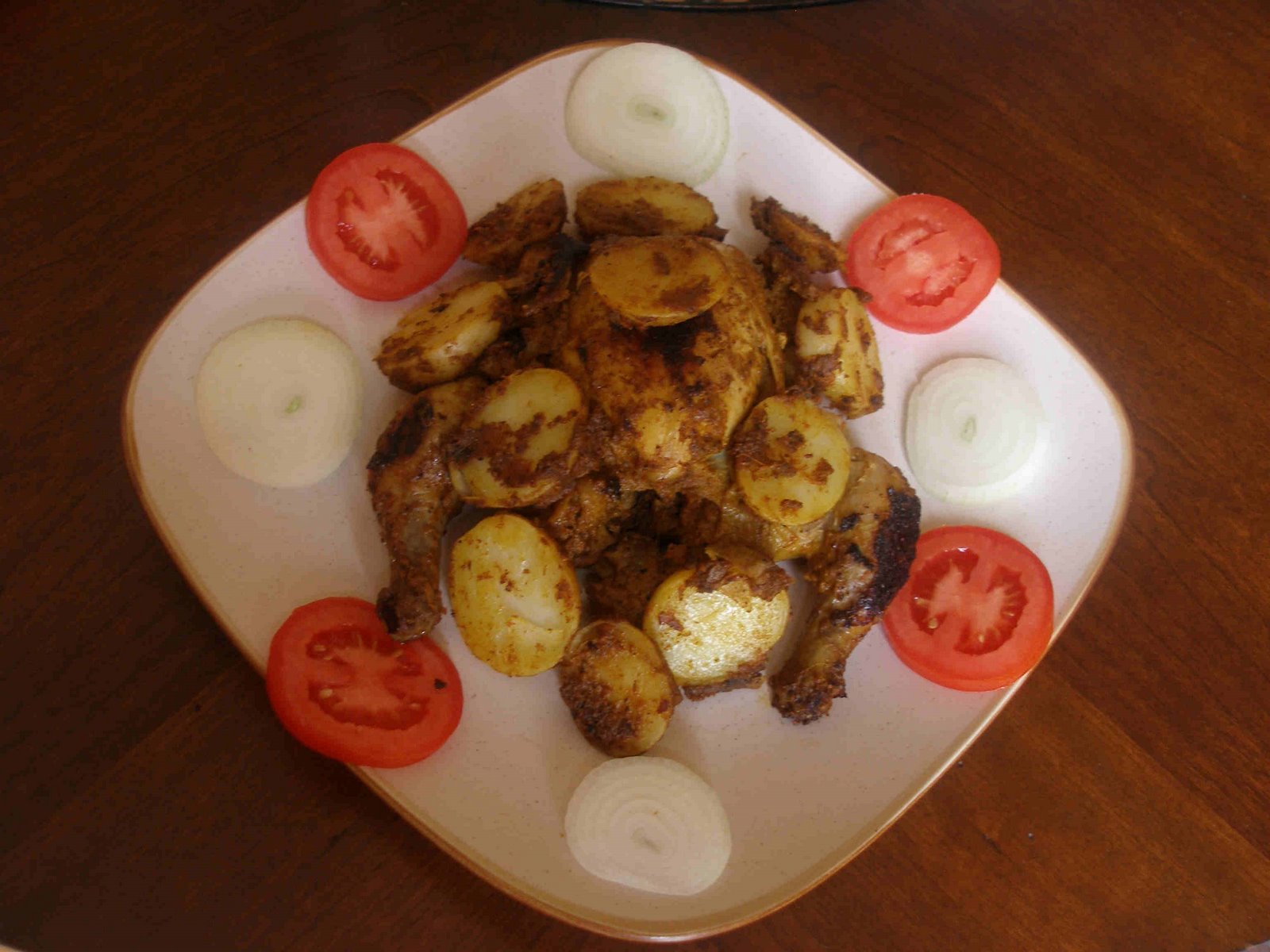 [potato+stuffed+cornish+hen.jpg]