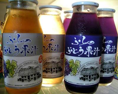 Close up of Hokkaido grape juice in glass bottles.