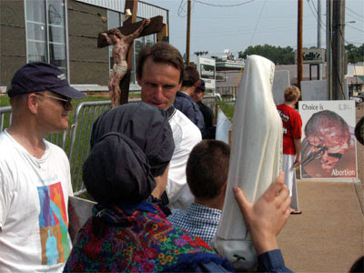 *Operation Save America members protest in front of an abortion clinic in Jackson, Mississippi during their 2006 National Event in that city. The group frequently uses images of aborted fetuses to attract attention to their cause