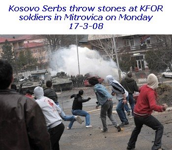 [serbs+mitrovica+stoning+police+station.jpg]