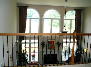 Balcony view of the spectacular windows & gorgeous views to rear yard