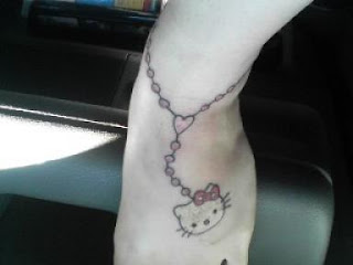 images of Kitty Ankle and foot Tattoo