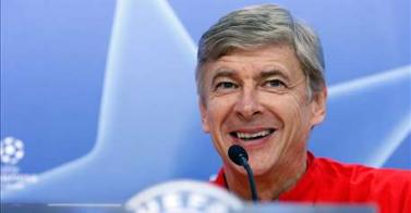 [Wenger+press+conf+laughing.jpg]