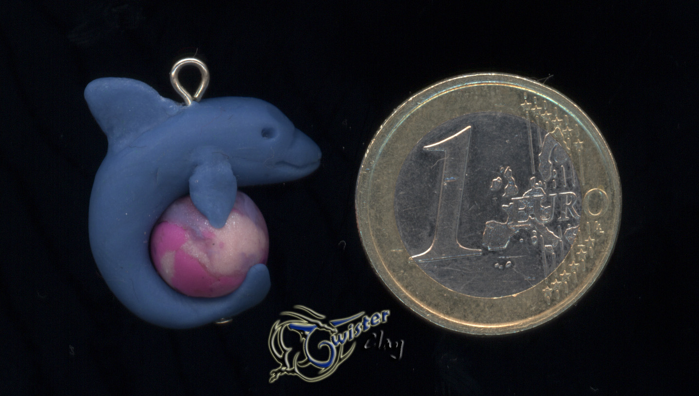 [colgante+delfin+sobre+negro+euro.jpg]