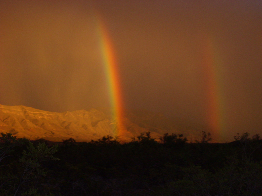 [rainbows+at+sunset.jpg]