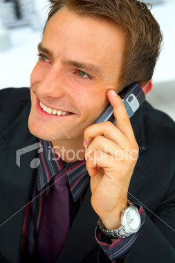 [ist2_2261524-businessman-making-a-phone-call.jpg]