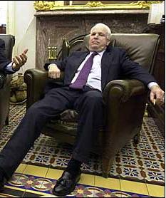 McCain, slumped