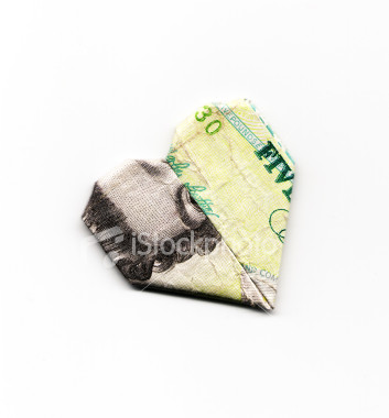 [ist2_656798_currency_british_bill_concept_valentine_s_day_origami_macro_heart_shape.jpg]