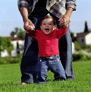 [father-teaching-baby-girl-9-12-months-how-to-walk-close-up-of-baby-~-200158846-001.jpg]