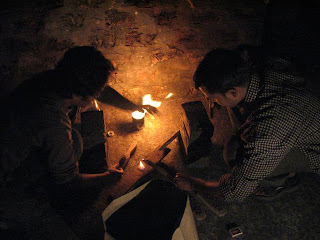 Khalid and me are preparing the fire for the barbecue