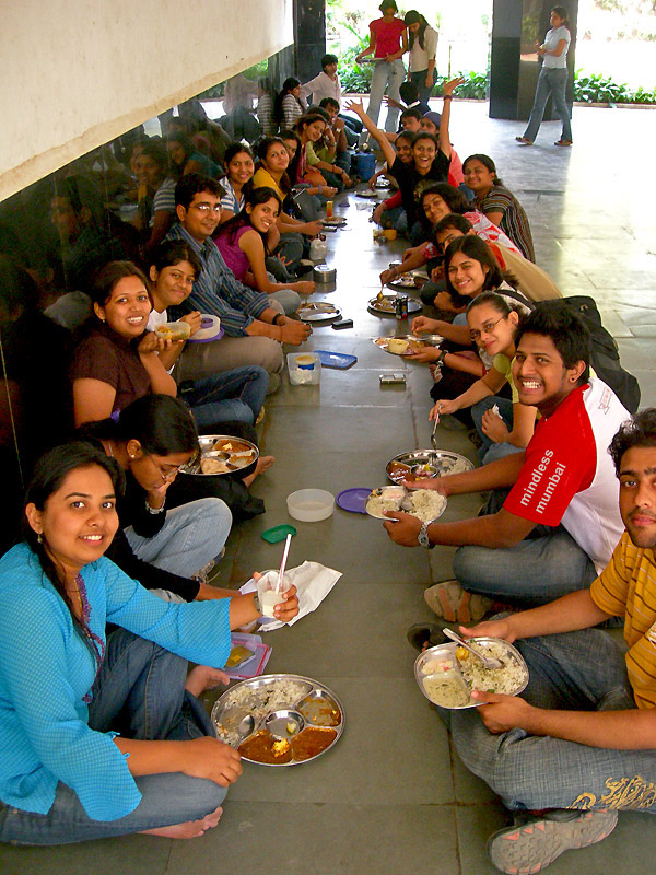 lunching with friends in a group in college
