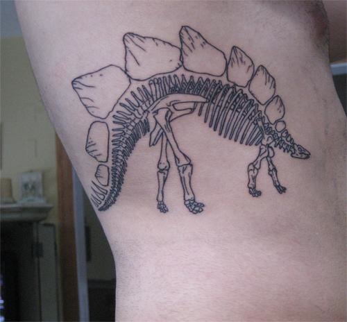 [tattoo+dinosaur+skeleton.jpg]