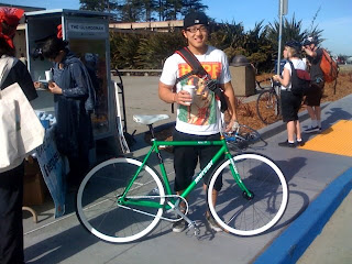 green fixie with white rims at City College