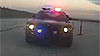 [112_0702_01ps+police_car+front_view.jpg]