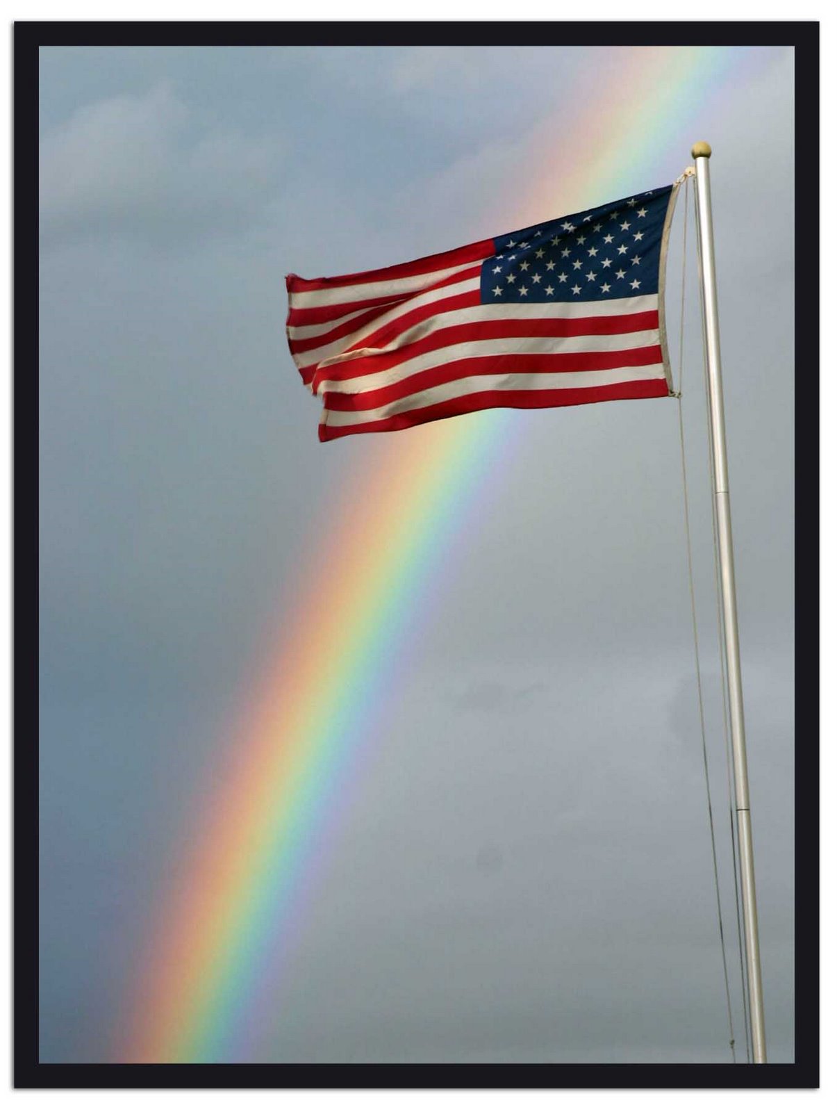 [American Flag Standing Tall over Rainbow.jpg]