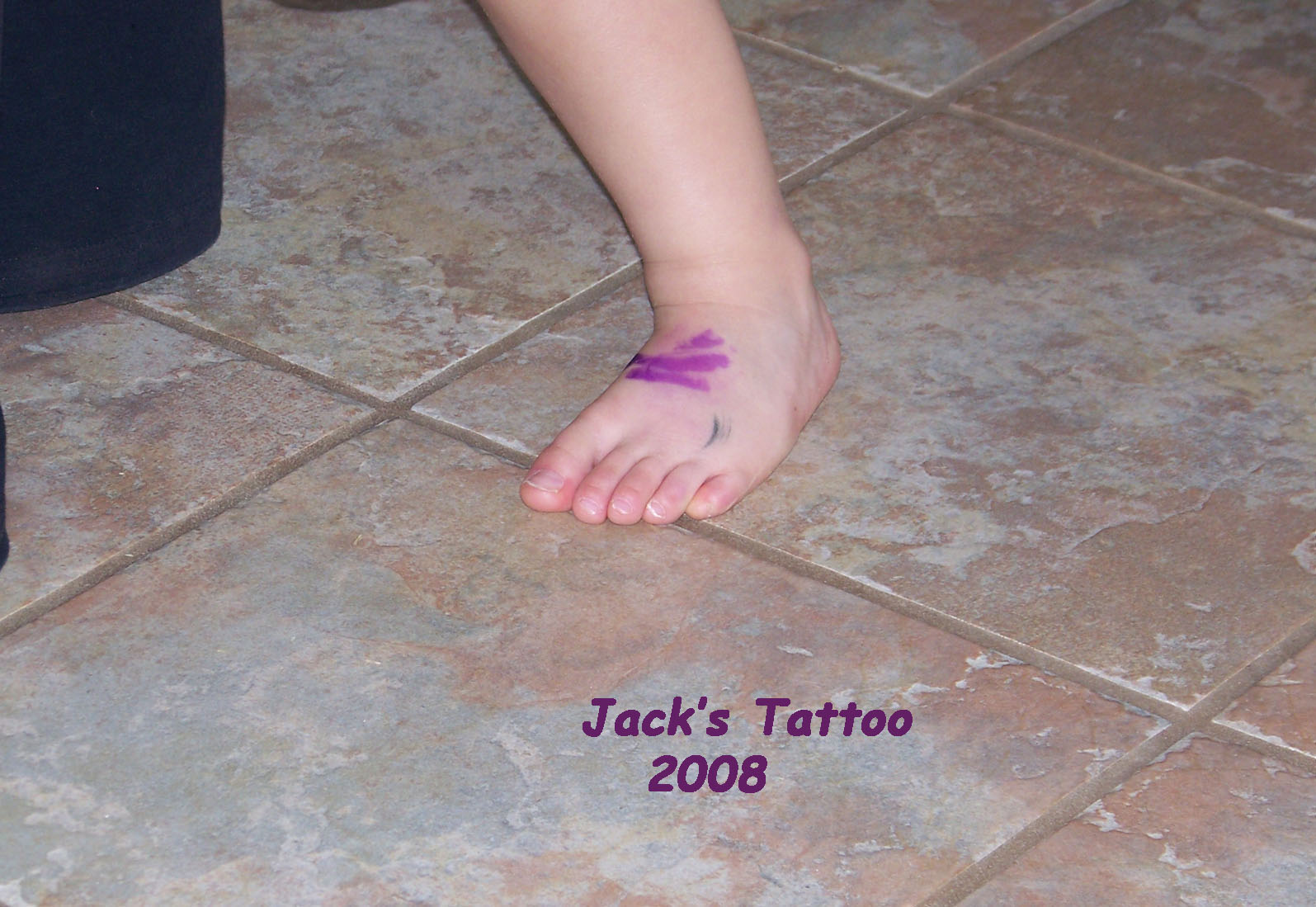 [2008+Easter+Jack+foot+tattoo.jpg]